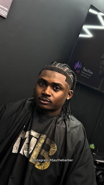 Client with a fresh cut and defined line-up in the MJB chair